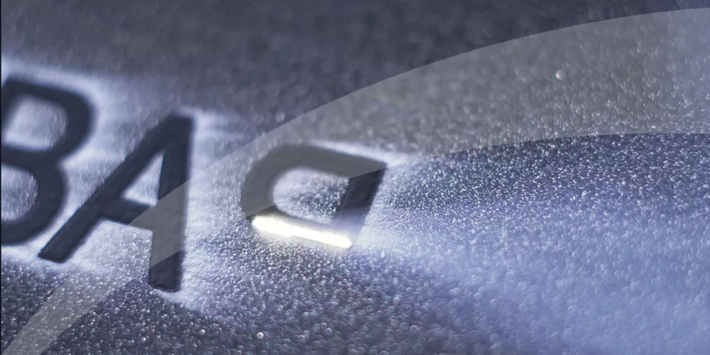 Material being marked by a laser marking system